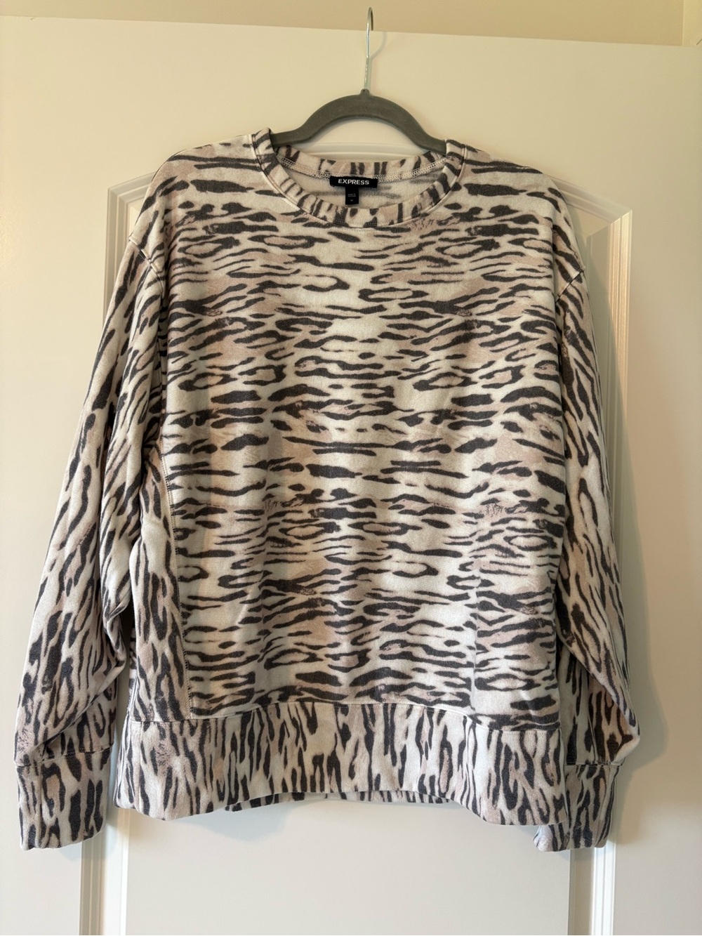Express animal print long sleeve top